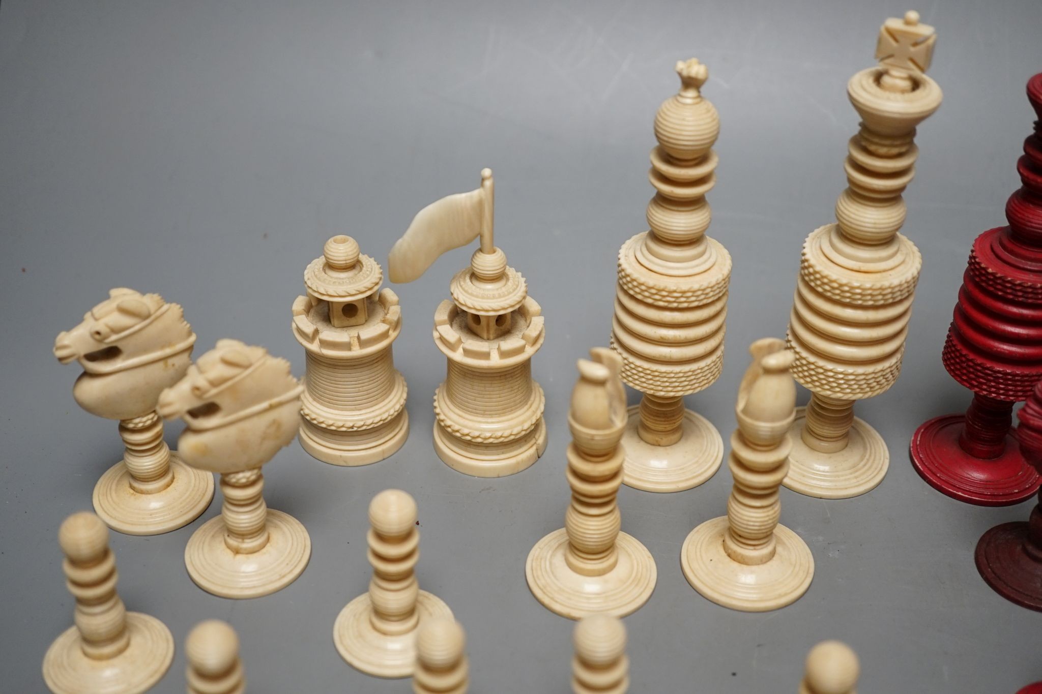A Chinese ivory chess set, Kings 14cm